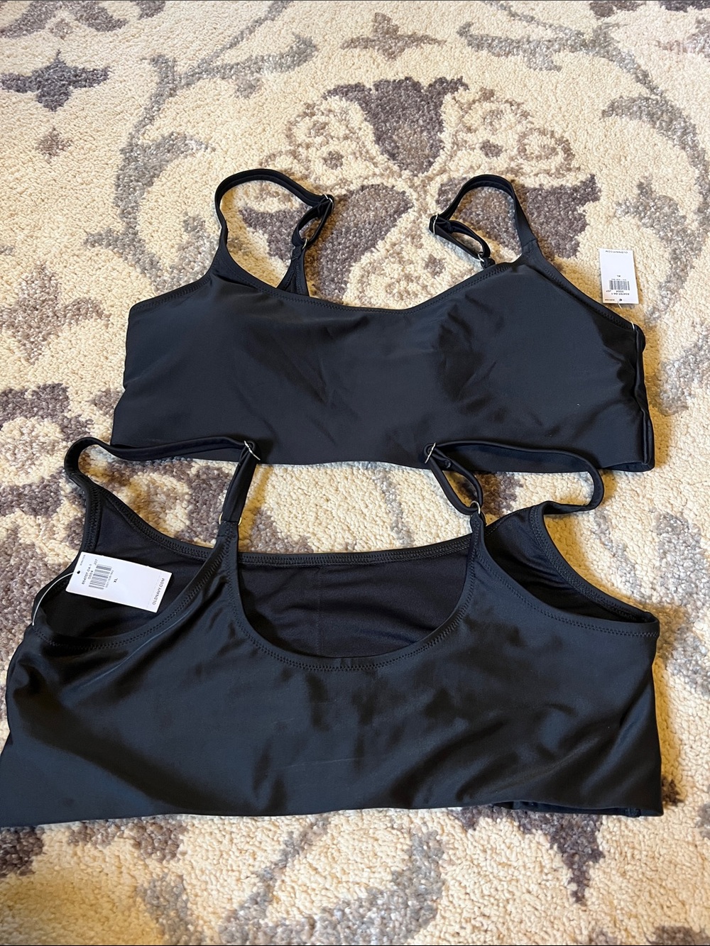 Two bikini tops